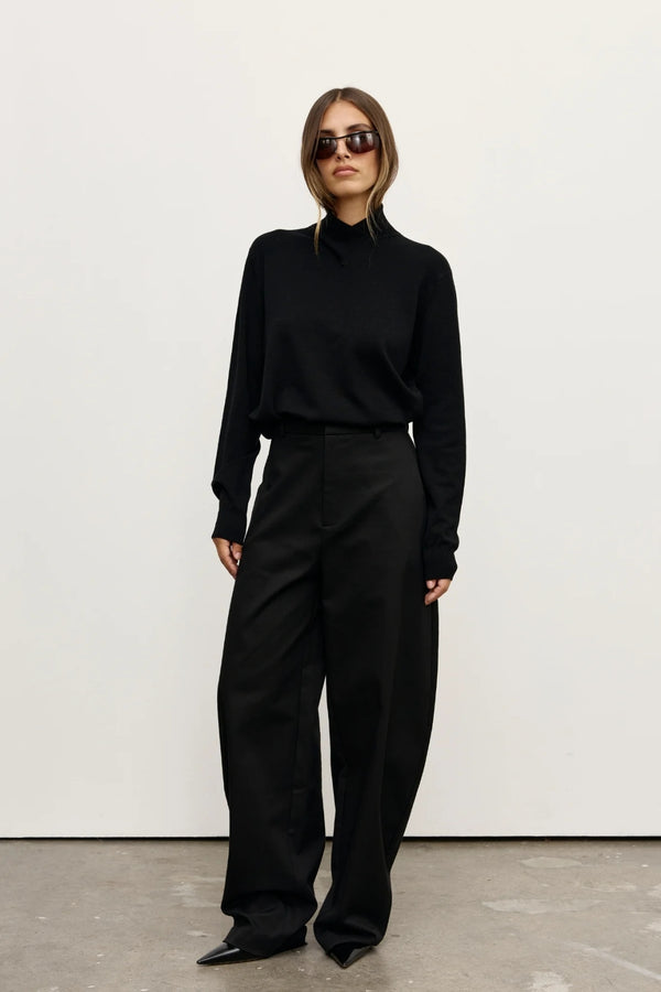 Yvette Knit Jumper Black by Bayse – relaxed fine knit jumper with crossover high neckline and dropped shoulders.