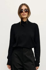 Yvette Knit Jumper Black by Bayse – relaxed fine knit jumper with crossover high neckline and dropped shoulders.
