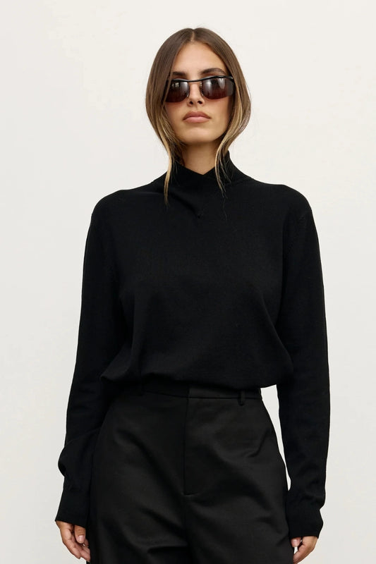 Yvette Knit Jumper Black by Bayse – relaxed fine knit jumper with crossover high neckline and dropped shoulders.