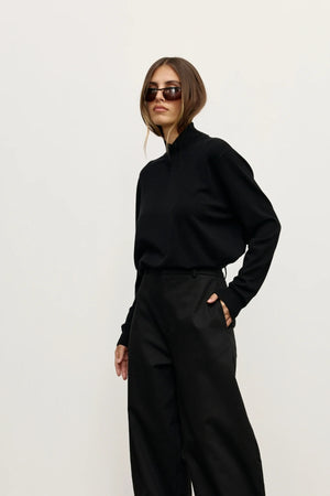 Yvette Knit Jumper Black by Bayse – relaxed fine knit jumper with crossover high neckline and dropped shoulders.