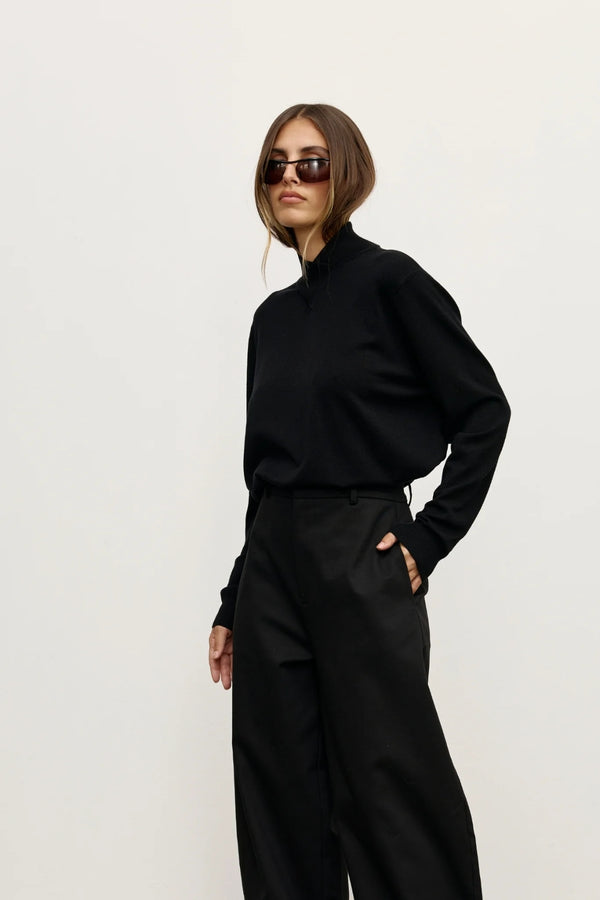 Yvette Knit Jumper Black by Bayse – relaxed fine knit jumper with crossover high neckline and dropped shoulders.