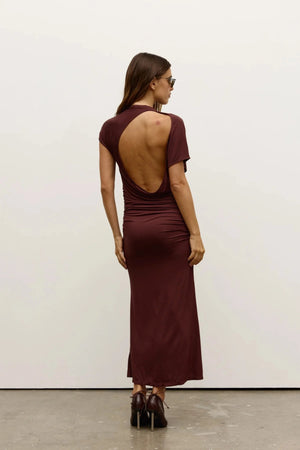 Yvone Midi Dress in Chocolate by Bayse, a fitted midi dress with a high neckline, waist ruching, and back cut-out detail.
