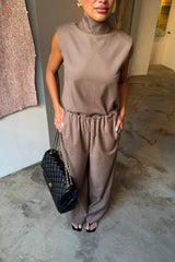 Zoe Relaxed Suit Pant Taupe by Sneaky Link – a wide-leg pant with ruched waistband and soft drape. Perfect for elevated styling.