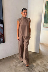 Zoe Turtleneck Suit Top Taupe by Sneaky Link – a structured top with turtleneck and clean lines. Perfect for elevated styling.