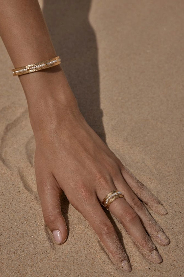 Zuni Bracelet by Amber Sceats - gold cuff bracelet with freshwater pearls, designed for a bold elevated statement look.