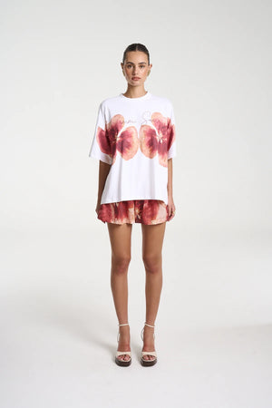 Aloha Tee by Summi Summi — a white cotton tee with a cropped boxy fit and hand-painted motifs, perfect for easy everyday styling.