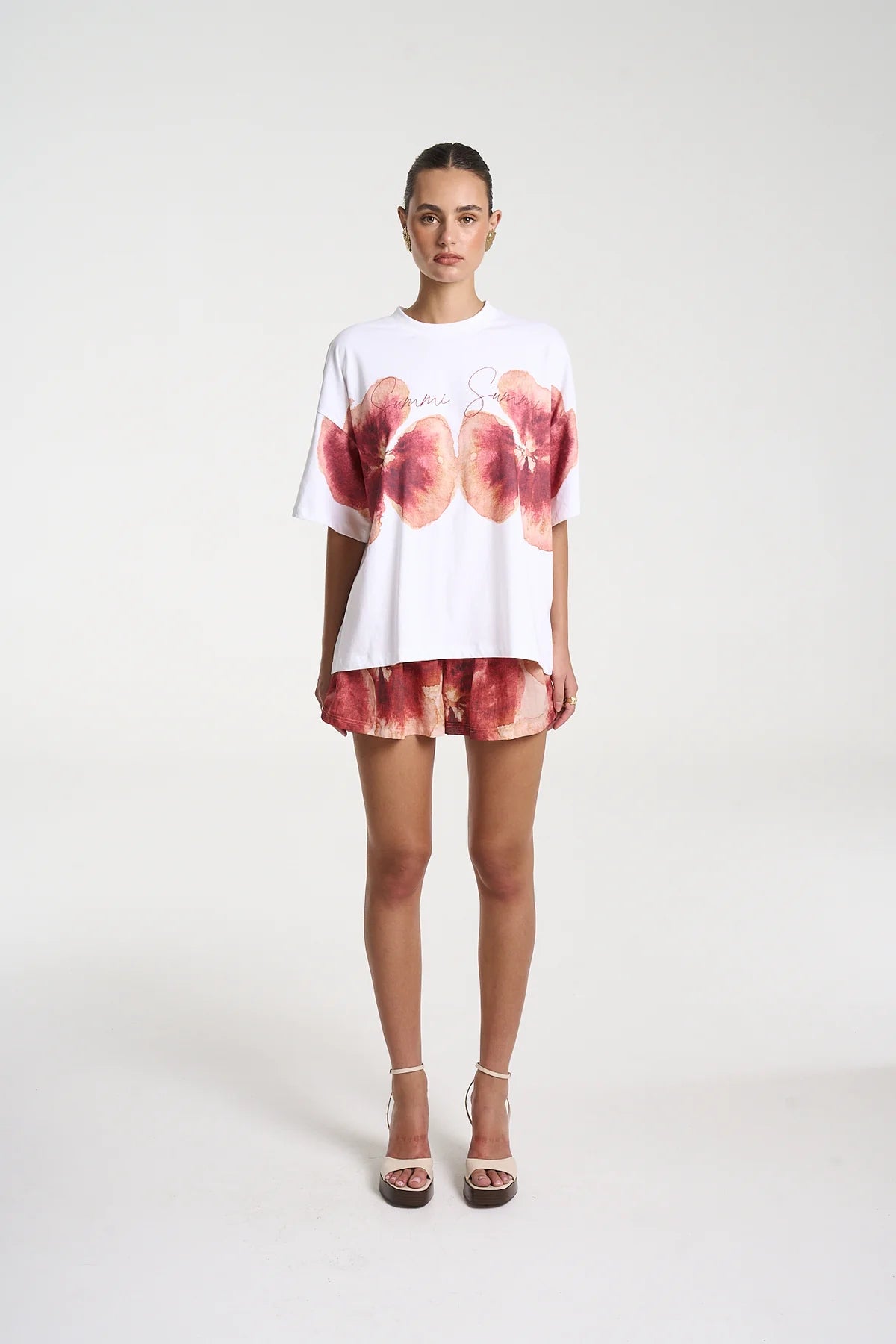 Aloha Tee by Summi Summi — a white cotton tee with a cropped boxy fit and hand-painted motifs, perfect for easy everyday styling.