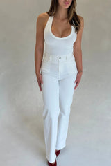 White Bronte halter neck tank top made of soft jersey fabric with a fitted silhouette.