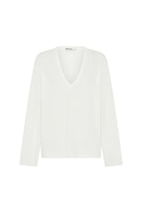 White Carter V Neck long sleeve top displayed on a mannequin with a fitted silhouette and soft fabric texture.