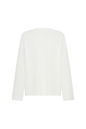 White Carter V Neck long sleeve top displayed on a mannequin with a relaxed fit and soft fabric texture.