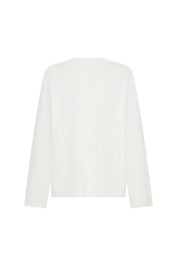 White Carter V Neck long sleeve top displayed on a mannequin with a relaxed fit and soft fabric texture.