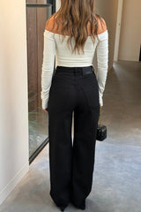 Celine High Rise Stretch Jean in jet black, featuring a slim fit and classic five-pocket design.