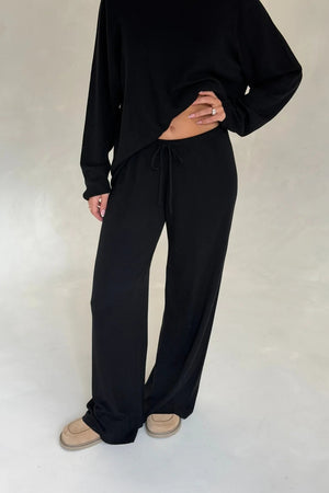 Black Charli knitted long sleeve top with a fitted silhouette and crew neckline.