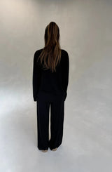 Black Charli knitted long sleeve top with a fitted silhouette and crew neckline.