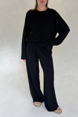 Black Charli knitted long sleeve top with a fitted silhouette and crew neckline.