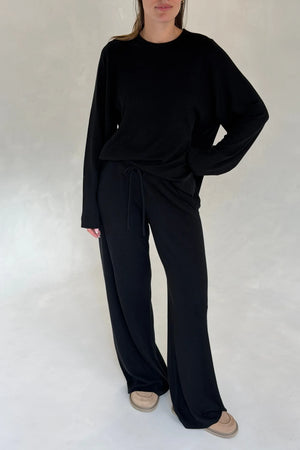 Black Charli knitted long sleeve top with a fitted silhouette and crew neckline.