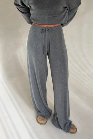 Charli knitted long sleeve top in grey with a soft, textured fabric and a relaxed fit.