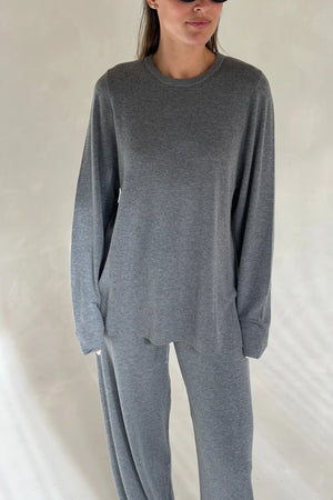 Charli knitted long sleeve top in grey with a soft, textured fabric and a relaxed fit.