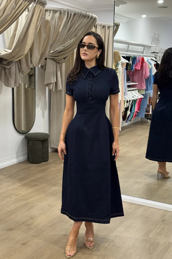 Dark blue cotton mix denim midi dress with a collared neckline and short sleeves.