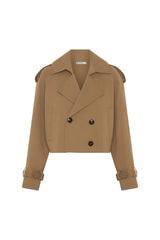 Tan cropped trench jacket with double-breasted buttons and a belted waist, styled on a mannequin.