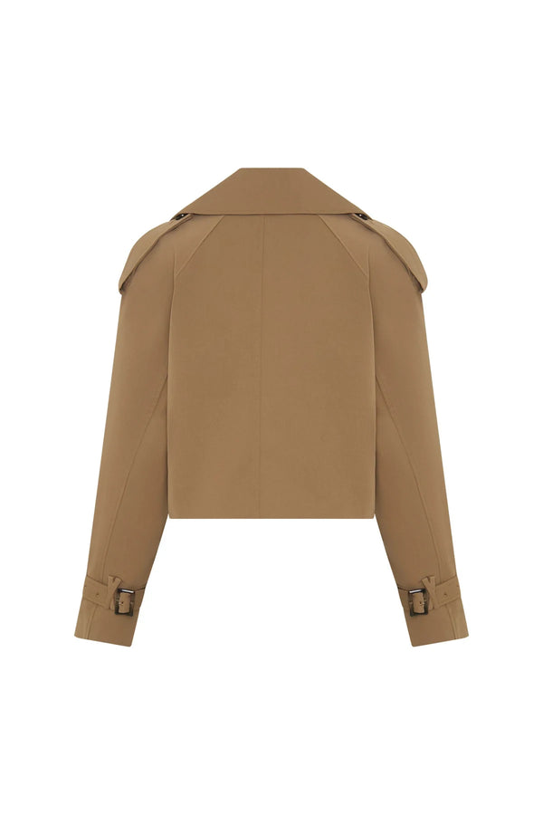 Tan cropped trench jacket with double-breasted buttons and a belted waist, styled on a mannequin.