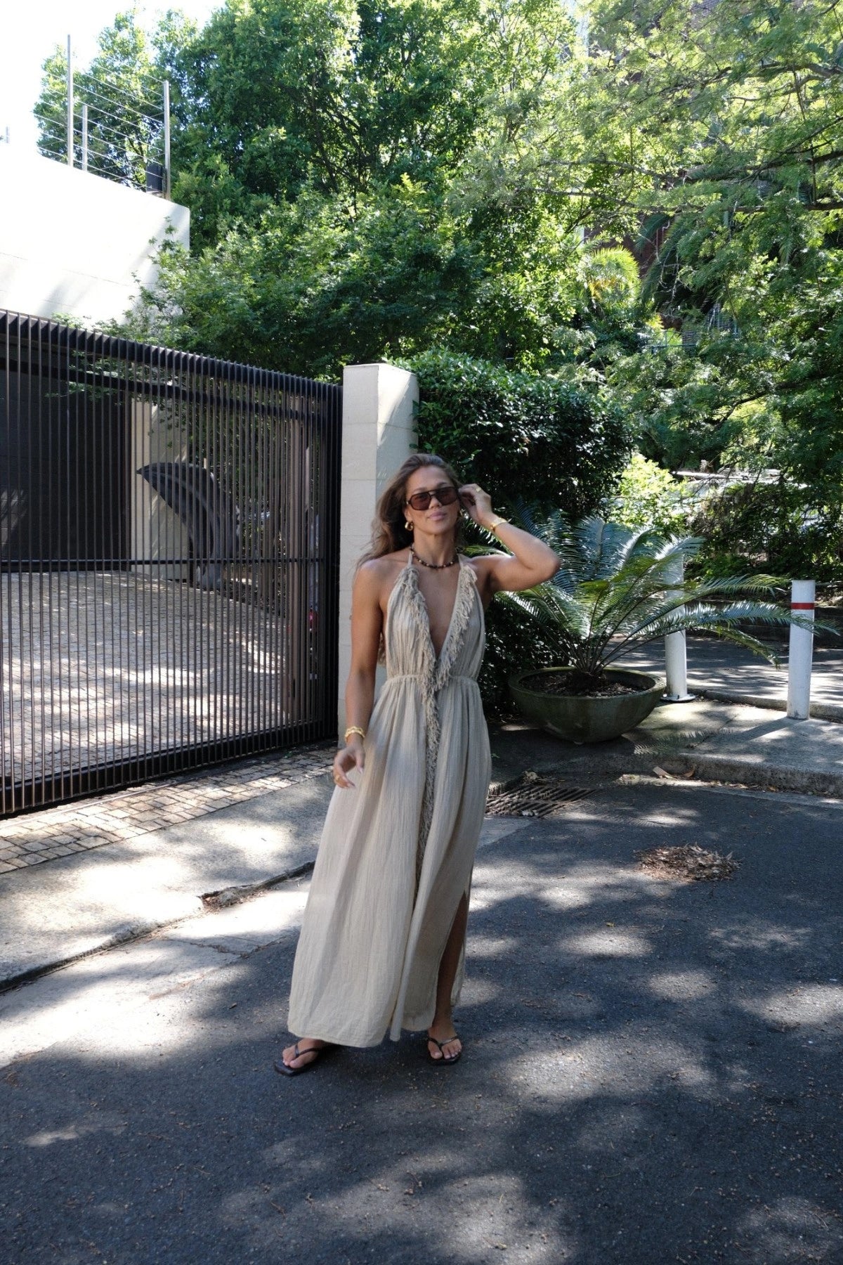 NEW Artemis Dress Sand by D'Artemide – Cotton halter dress with cutout, front split, cold hand wash, and delicate boho style.