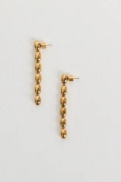 dith Earrings by Heaven Mayhem – gold twisted-bead drop earrings with sculptural movement and shine, perfect for refined everyday styling.
