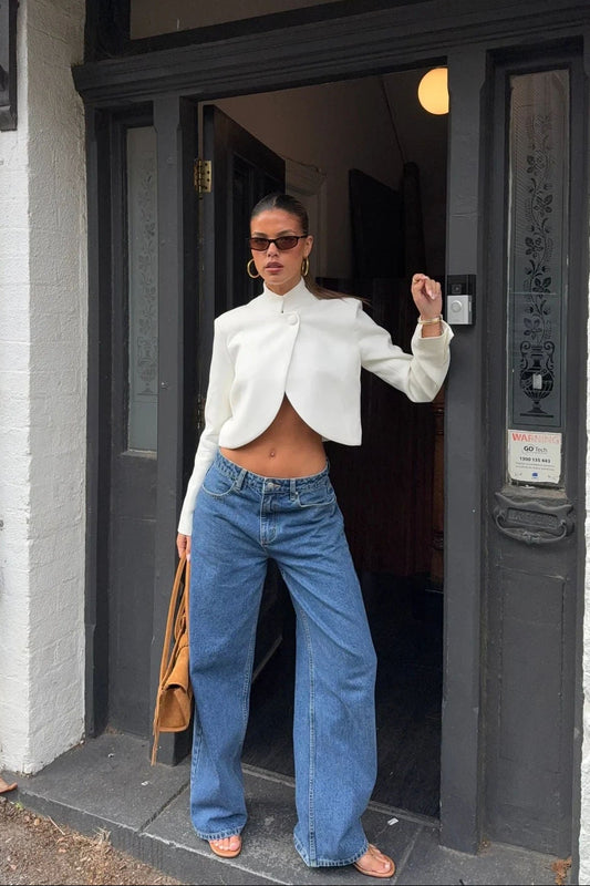 White cropped blazer top with long sleeves and a tailored fit from Ella Squire.