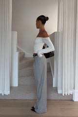White off-shoulder top with ruffled neckline and short sleeves from Ella Squire.