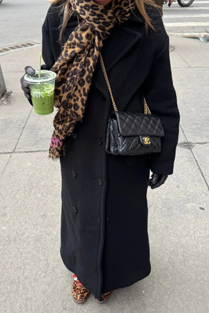 Double Breasted Coat Black by Sneaky Link – Timeless oversized wool coat combining warmth and sophistication. Perfect for any occasion.