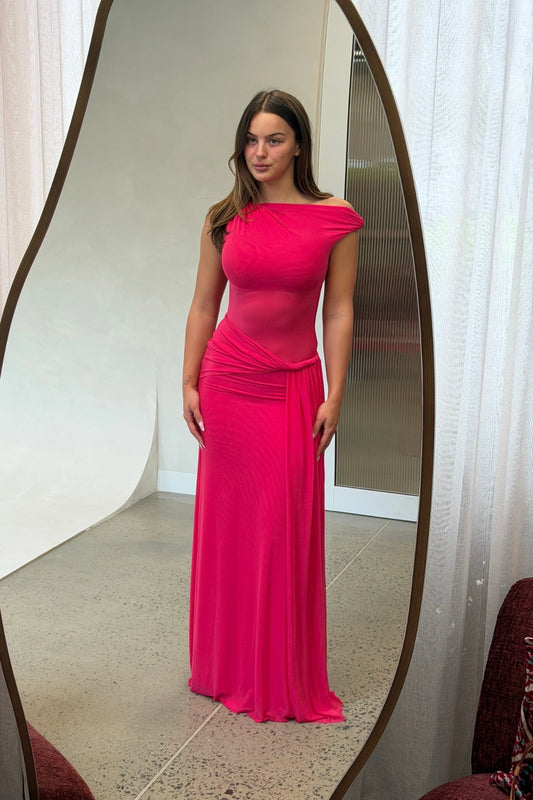 Sisal Mesh Dress Bright Rose by Misha - draped mesh maxi dress with twisted off-shoulder neckline and waterfall sash, perfect for day-to-night styling.