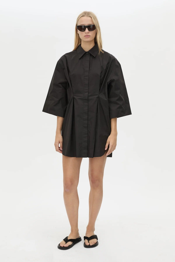 Avant Shirt Dress in Black by Camilla and Marc, a collared cotton shirt dress with pleat detailing, flared sleeves, and side splits.