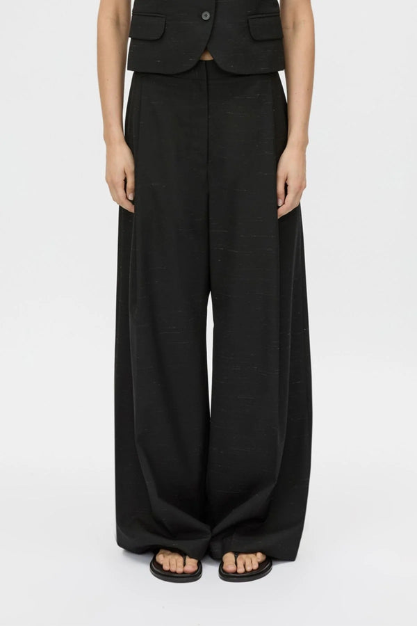 Aya Pant by Camilla and Marc in black, low-rise wool tailored design with subtle flare and pressed creases.