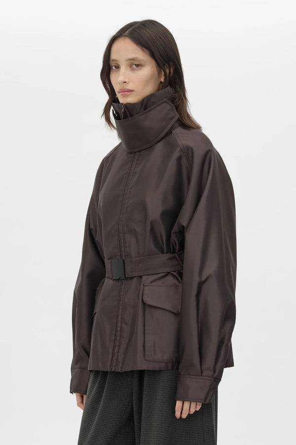 Drea Puffer Jacket in Espresso by Camilla and Marc, a cream funnel-neck puffer with waist belt, raglan sleeves and detachable throat latch.