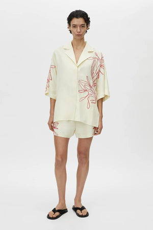 Eviva Shirt by Camilla and Marc – a lemon short-sleeve shirt with beaded embroidery and clean lines, perfect for bright polished days.