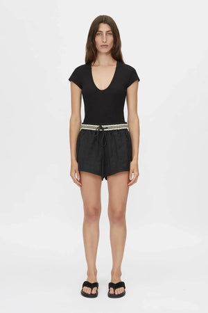 Mimas Monogram Short by Camilla and Marc in black, elasticated waist short with striped waistband and logo embroidery.