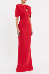 Rebecca Vallance Cameron Gown in red bonded crepe with draped cape overlay, V neckline and column maxi skirt, elegant evening style.
