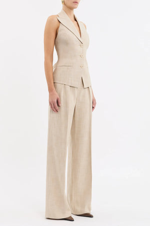 Rebecca Vallance Andy Vest in beige two-tone linen with halter neckline, peak lapel and tailored fit, styled for modern sophistication.