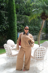 Tan and chocolate braided collar jacket with button front and long sleeves, displayed on a white background.