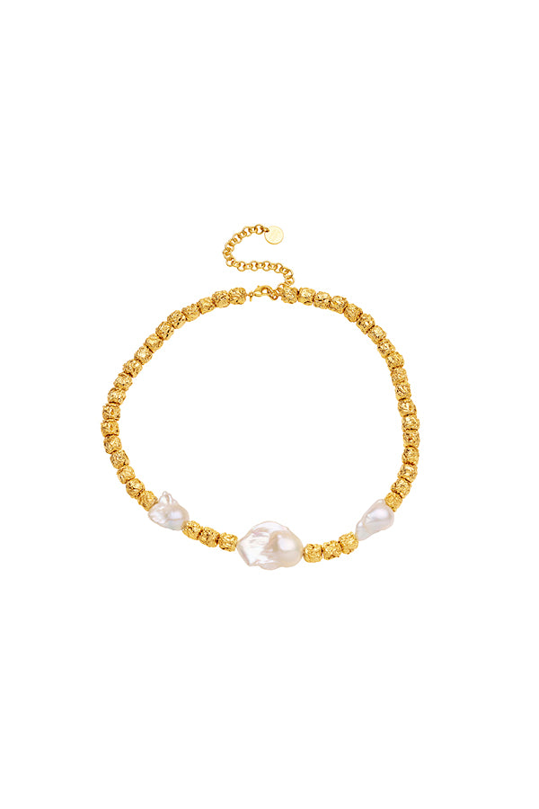 Giselle Necklace by Amber Sceats, a viral statement piece with 24k gold-plated brass and unique freshwater pearls, perfect for adding elegance to any outfit.