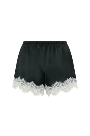 Lilah Short in black and ivory with a relaxed fit and mid-thigh length, featuring a subtle two-tone design.