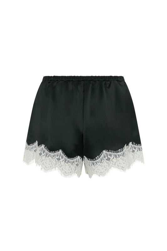 Lilah Short in black and ivory with a relaxed fit and mid-thigh length, featuring a subtle two-tone design.