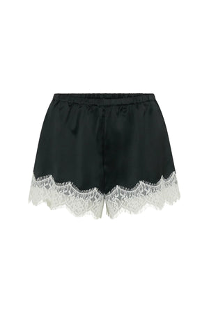Lilah Short in black and ivory with a relaxed fit and mid-thigh length, styled on a neutral background.