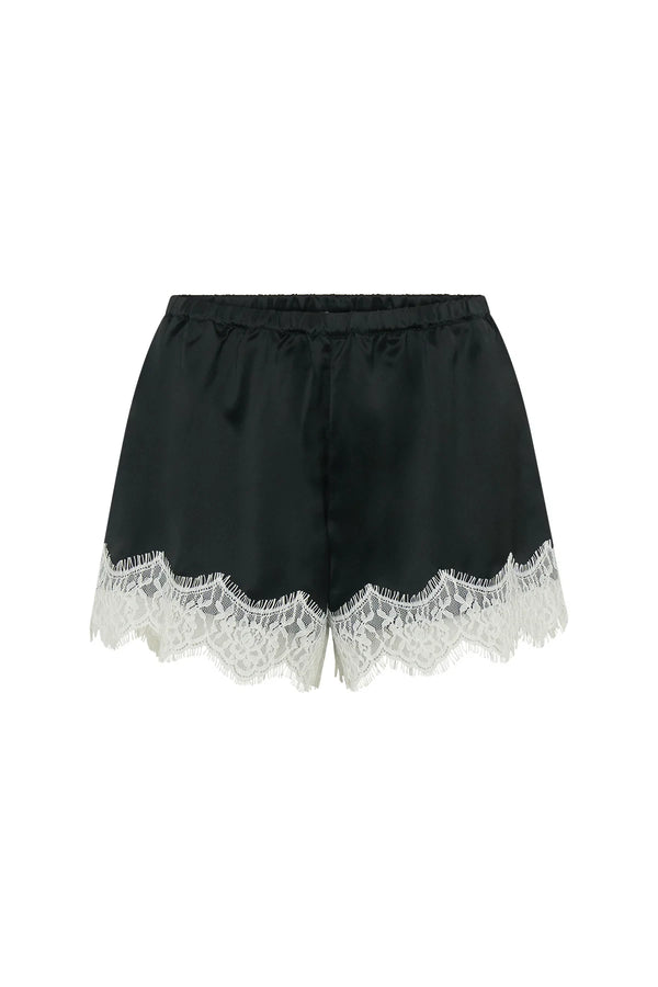 Lilah Short in black and ivory with a relaxed fit and mid-thigh length, styled on a neutral background.
