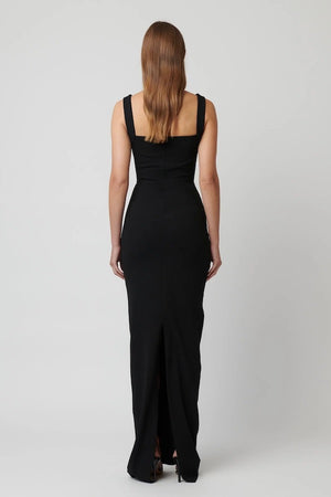 Marbella Gown Black by Effie Kats – A sleek black gown with bustier-inspired bodice, draped detail, and split hem for graceful movement.