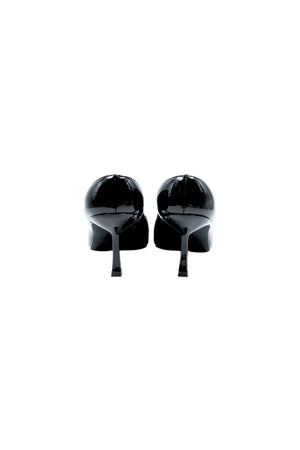 Monty Black Patent Mule with a sleek black patent leather upper and a low block heel.