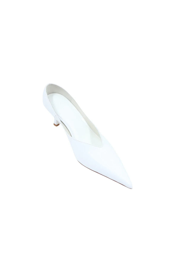 Monty White Patent Mule with a sleek white patent leather upper and a low block heel.