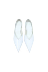 Monty White Patent Mule with a sleek white patent leather upper and a low block heel.