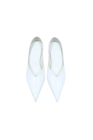 Monty White Patent Mule with a sleek white patent leather upper and a low block heel.