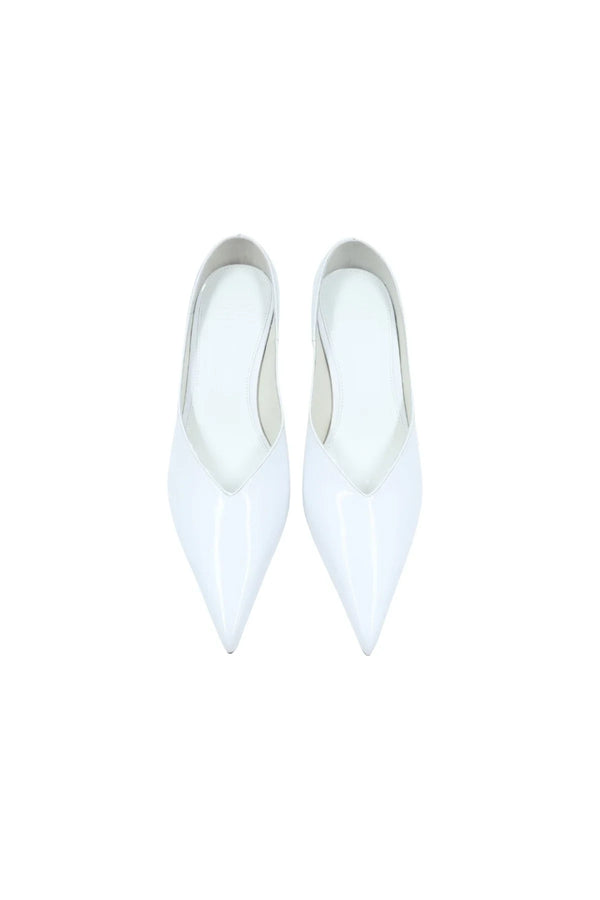 Monty White Patent Mule with a sleek white patent leather upper and a low block heel.